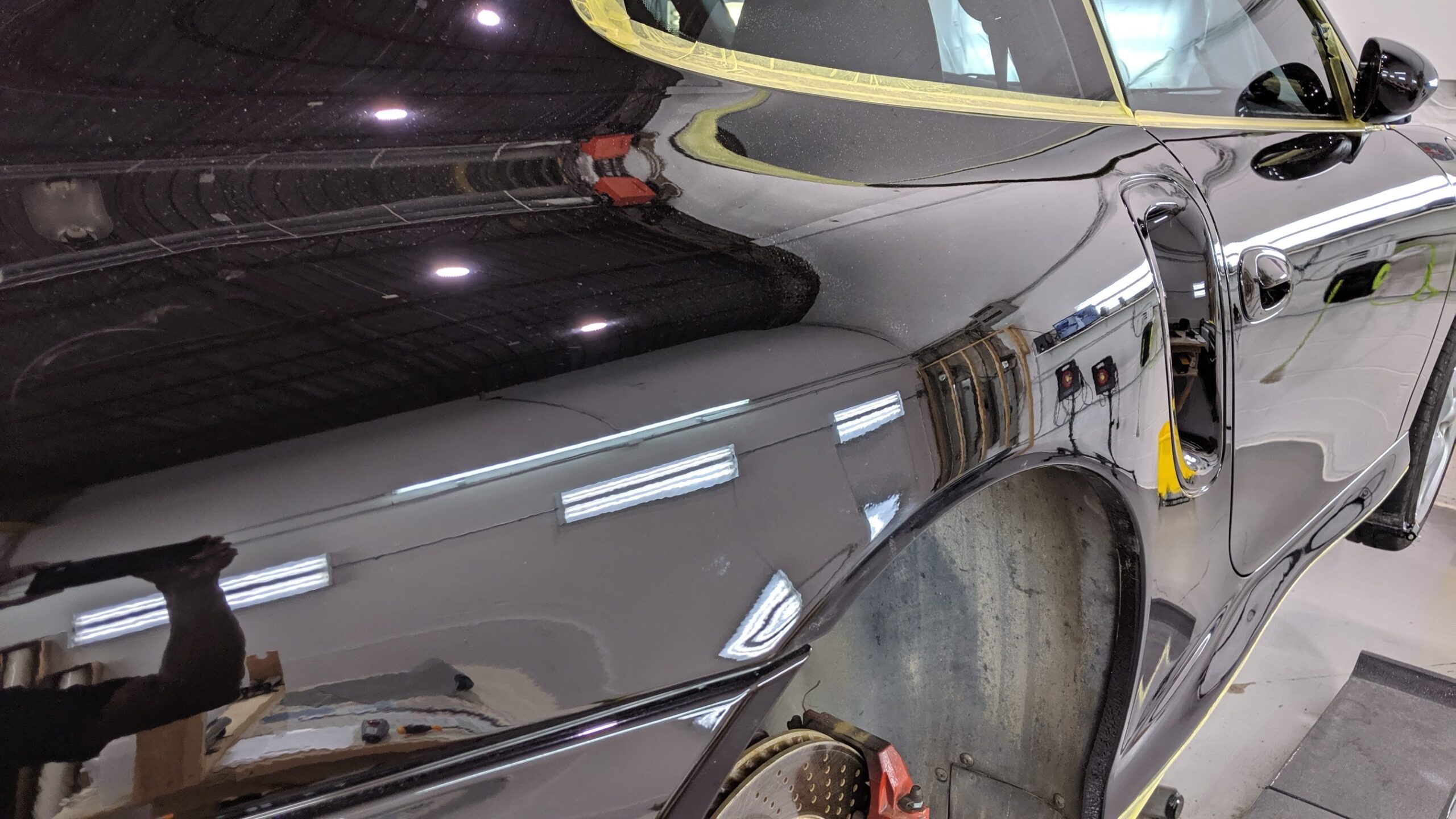 Paint correction work removing swirl marks and oxidation from vehicle paint