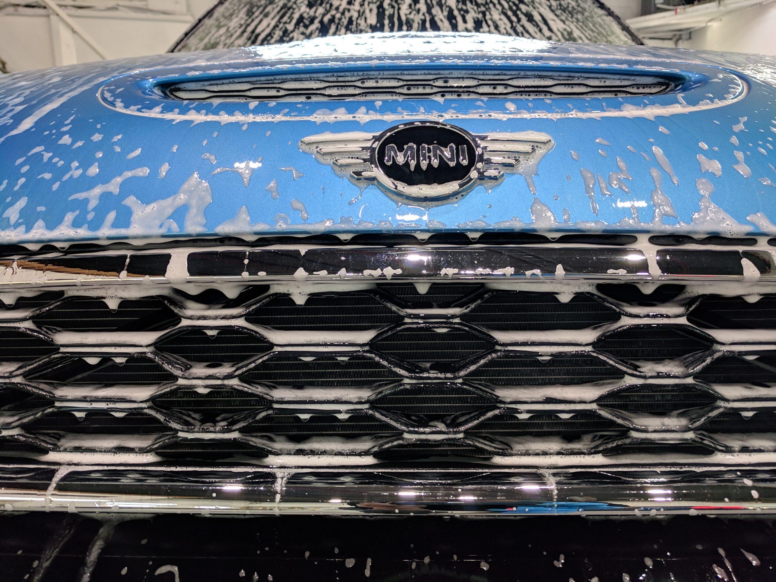 Detailed vehicle exterior with thorough wash and clay treatment
