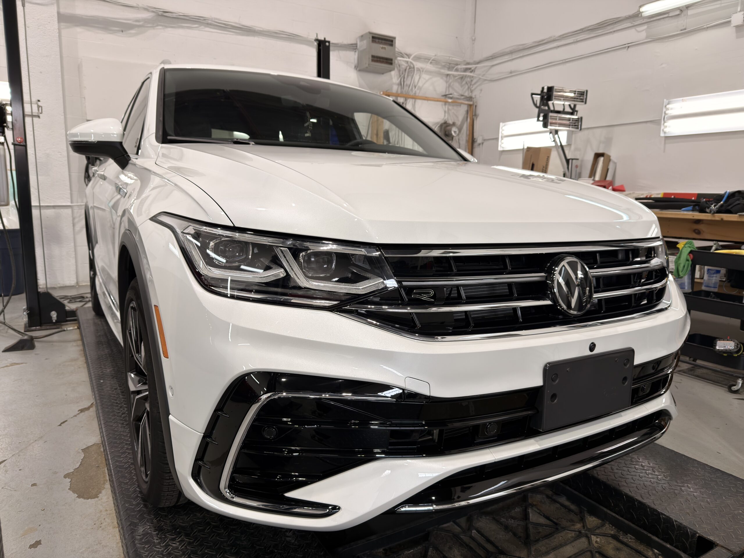 Is PPF worth it in the GTA: clear paint protection film being installed on a front end in Markham